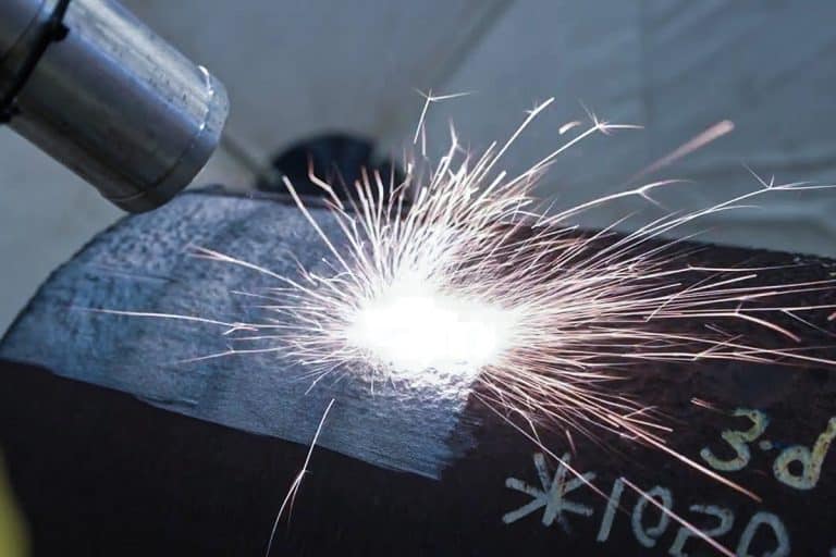 How do pulse frequency and repetition rate affect laser cleaning efficiency